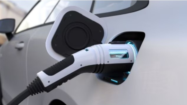 Electric car manufacturing in India factory with assembly line and EV components